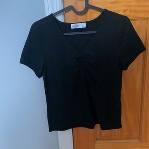 Cute plain black tee shirt with a ring in middle